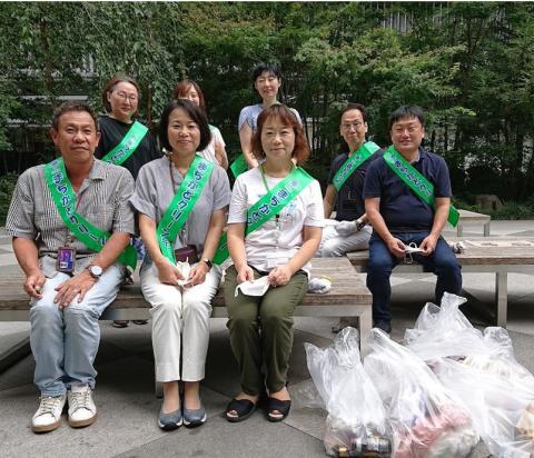 Volunteer posing together